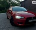 Червоний Міцубісі Lancer, об'ємом двигуна 2 л та пробігом 101 тис. км за 6999 $, фото 25 на Automoto.ua