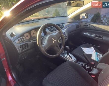 Красный Мицубиси Лансер, объемом двигателя 0 л и пробегом 282 тыс. км за 5200 $, фото 6 на Automoto.ua