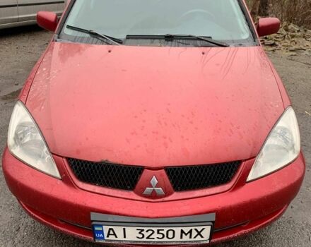 Червоний Міцубісі Lancer, об'ємом двигуна 1.6 л та пробігом 300 тис. км за 2799 $, фото 1 на Automoto.ua