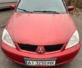 Червоний Міцубісі Lancer, об'ємом двигуна 1.6 л та пробігом 300 тис. км за 2799 $, фото 1 на Automoto.ua
