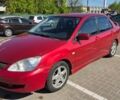 Червоний Міцубісі Lancer, об'ємом двигуна 1.6 л та пробігом 201 тис. км за 4310 $, фото 1 на Automoto.ua