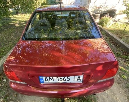 Красный Мицубиси Лансер, объемом двигателя 1.6 л и пробегом 277 тыс. км за 3299 $, фото 9 на Automoto.ua