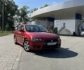 Красный Мицубиси Лансер, объемом двигателя 2 л и пробегом 224 тыс. км за 5800 $, фото 1 на Automoto.ua