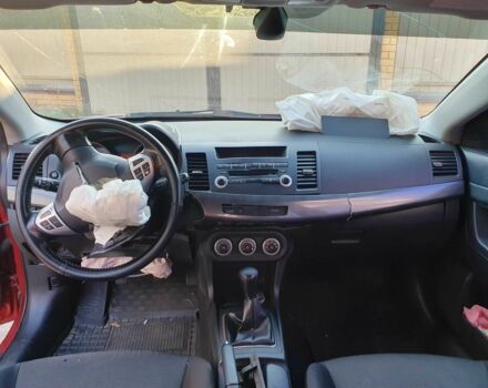 Красный Мицубиси Лансер, объемом двигателя 2 л и пробегом 406 тыс. км за 2750 $, фото 13 на Automoto.ua