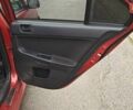 Червоний Міцубісі Lancer, об'ємом двигуна 2 л та пробігом 186 тис. км за 5600 $, фото 24 на Automoto.ua