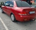 Красный Мицубиси Лансер, объемом двигателя 1.58 л и пробегом 506 тыс. км за 2700 $, фото 1 на Automoto.ua