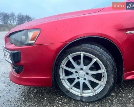 Красный Мицубиси Лансер, объемом двигателя 1.5 л и пробегом 241 тыс. км за 5850 $, фото 12 на Automoto.ua