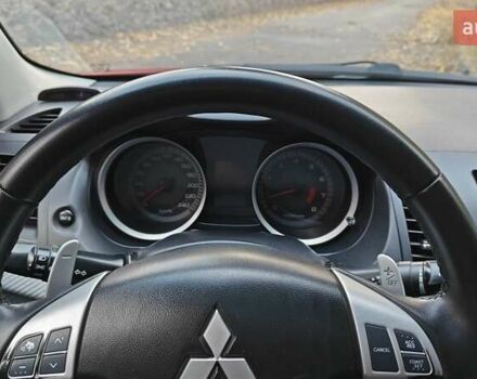 Красный Мицубиси Лансер, объемом двигателя 2 л и пробегом 186 тыс. км за 5600 $, фото 23 на Automoto.ua