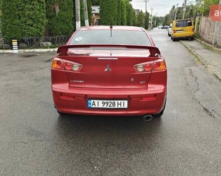 Червоний Міцубісі Lancer, об'ємом двигуна 2 л та пробігом 186 тис. км за 5600 $, фото 10 на Automoto.ua