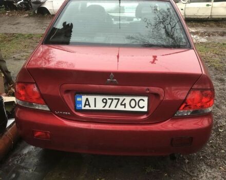 Червоний Міцубісі Lancer, об'ємом двигуна 1.6 л та пробігом 286 тис. км за 3450 $, фото 1 на Automoto.ua
