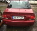 Червоний Міцубісі Lancer, об'ємом двигуна 1.6 л та пробігом 286 тис. км за 3450 $, фото 1 на Automoto.ua