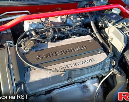 Червоний Міцубісі Lancer, об'ємом двигуна 2 л та пробігом 164 тис. км за 4900 $, фото 8 на Automoto.ua