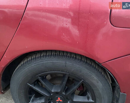 Красный Мицубиси Лансер, объемом двигателя 1.58 л и пробегом 269 тыс. км за 3899 $, фото 9 на Automoto.ua