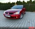 Червоний Міцубісі Lancer, об'ємом двигуна 1.6 л та пробігом 146 тис. км за 6900 $, фото 1 на Automoto.ua