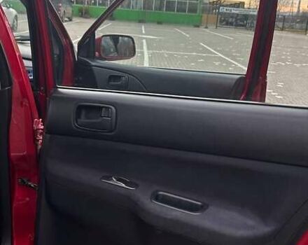 Красный Мицубиси Лансер, объемом двигателя 1.6 л и пробегом 176 тыс. км за 4300 $, фото 19 на Automoto.ua