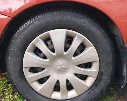 Красный Мицубиси Лансер, объемом двигателя 1.6 л и пробегом 214 тыс. км за 5000 $, фото 16 на Automoto.ua