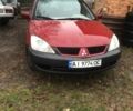 Червоний Міцубісі Lancer, об'ємом двигуна 1.6 л та пробігом 286 тис. км за 3450 $, фото 1 на Automoto.ua