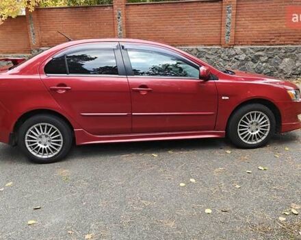 Червоний Міцубісі Lancer, об'ємом двигуна 2 л та пробігом 187 тис. км за 5500 $, фото 8 на Automoto.ua