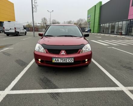 Красный Мицубиси Лансер, объемом двигателя 1.6 л и пробегом 285 тыс. км за 3650 $, фото 3 на Automoto.ua