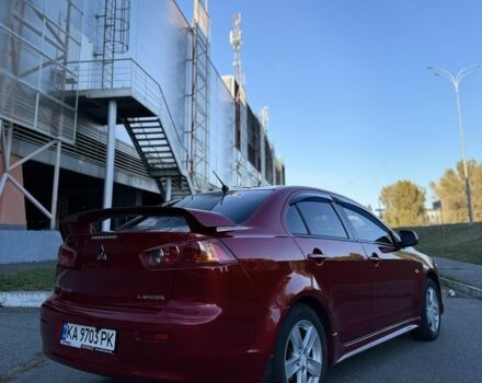 Красный Мицубиси Лансер, объемом двигателя 2 л и пробегом 307 тыс. км за 6499 $, фото 5 на Automoto.ua