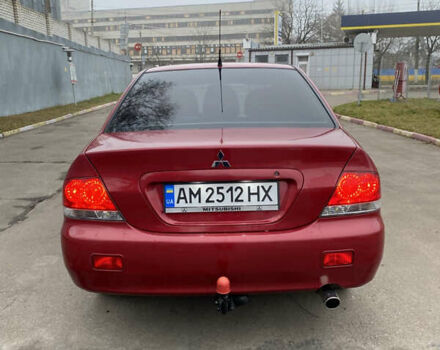Червоний Міцубісі Lancer, об'ємом двигуна 1.58 л та пробігом 151 тис. км за 5600 $, фото 5 на Automoto.ua