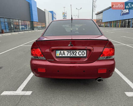 Красный Мицубиси Лансер, объемом двигателя 1.58 л и пробегом 285 тыс. км за 3650 $, фото 8 на Automoto.ua