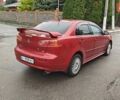 Червоний Міцубісі Lancer, об'ємом двигуна 2 л та пробігом 187 тис. км за 5600 $, фото 8 на Automoto.ua