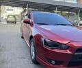 Красный Мицубиси Лансер, объемом двигателя 2 л и пробегом 267 тыс. км за 7000 $, фото 2 на Automoto.ua