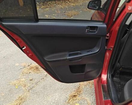 Красный Мицубиси Лансер, объемом двигателя 2 л и пробегом 186 тыс. км за 5600 $, фото 28 на Automoto.ua