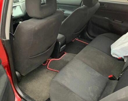 Червоний Міцубісі Lancer, об'ємом двигуна 1.6 л та пробігом 300 тис. км за 2799 $, фото 6 на Automoto.ua