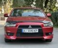 Червоний Міцубісі Lancer, об'ємом двигуна 2 л та пробігом 307 тис. км за 6500 $, фото 1 на Automoto.ua