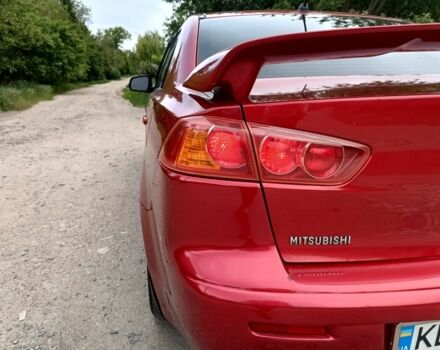 Червоний Міцубісі Lancer, об'ємом двигуна 2 л та пробігом 259 тис. км за 6500 $, фото 2 на Automoto.ua