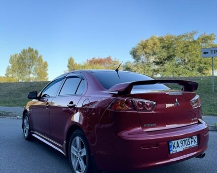 Красный Мицубиси Лансер, объемом двигателя 2 л и пробегом 307 тыс. км за 6499 $, фото 4 на Automoto.ua