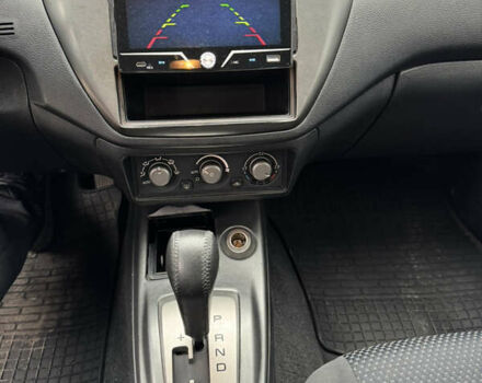 Красный Мицубиси Лансер, объемом двигателя 1.58 л и пробегом 285 тыс. км за 3650 $, фото 11 на Automoto.ua