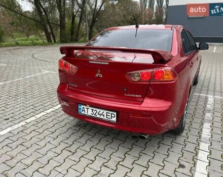 Красный Мицубиси Лансер, объемом двигателя 1.5 л и пробегом 207 тыс. км за 4500 $, фото 6 на Automoto.ua