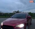 Красный Мицубиси Лансер, объемом двигателя 2 л и пробегом 329 тыс. км за 5500 $, фото 1 на Automoto.ua