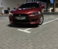 Червоний Міцубісі Lancer, об'ємом двигуна 2 л та пробігом 240 тис. км за 5899 $, фото 1 на Automoto.ua