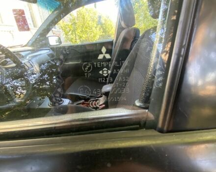 Красный Мицубиси Лансер, объемом двигателя 1.6 л и пробегом 277 тыс. км за 3299 $, фото 10 на Automoto.ua