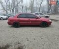 Червоний Міцубісі Lancer, об'ємом двигуна 1.6 л та пробігом 267 тис. км за 2999 $, фото 5 на Automoto.ua