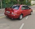 Червоний Міцубісі Lancer, об'ємом двигуна 1.59 л та пробігом 243 тис. км за 4300 $, фото 14 на Automoto.ua