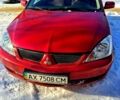 Червоний Міцубісі Lancer, об'ємом двигуна 1.6 л та пробігом 111 тис. км за 5200 $, фото 1 на Automoto.ua
