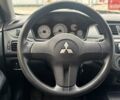 Красный Мицубиси Лансер, объемом двигателя 1.59 л и пробегом 212 тыс. км за 5490 $, фото 13 на Automoto.ua