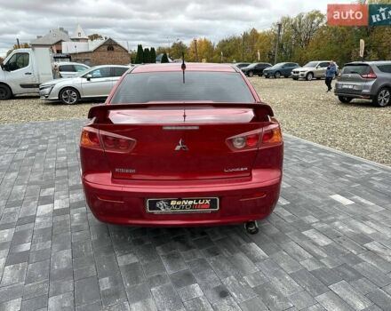Червоний Міцубісі Lancer, об'ємом двигуна 2 л та пробігом 293 тис. км за 6399 $, фото 7 на Automoto.ua
