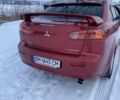 Червоний Міцубісі Lancer, об'ємом двигуна 2 л та пробігом 171 тис. км за 7500 $, фото 25 на Automoto.ua