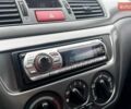 Красный Мицубиси Лансер, объемом двигателя 1.59 л и пробегом 212 тыс. км за 5490 $, фото 17 на Automoto.ua