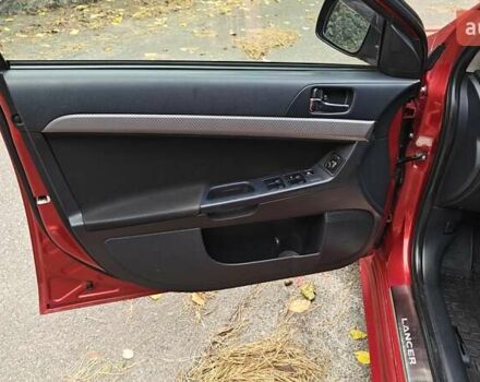 Червоний Міцубісі Lancer, об'ємом двигуна 2 л та пробігом 187 тис. км за 5500 $, фото 21 на Automoto.ua