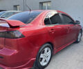 Червоний Міцубісі Lancer, об'ємом двигуна 2 л та пробігом 254 тис. км за 7500 $, фото 3 на Automoto.ua
