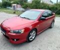 Червоний Міцубісі Lancer, об'ємом двигуна 2 л та пробігом 259 тис. км за 6500 $, фото 1 на Automoto.ua