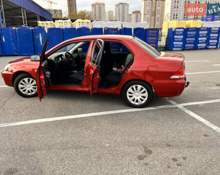 Червоний Міцубісі Lancer, об'ємом двигуна 1.6 л та пробігом 194 тис. км за 5500 $, фото 9 на Automoto.ua