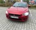 Красный Мицубиси Лансер, объемом двигателя 1.5 л и пробегом 207 тыс. км за 4500 $, фото 1 на Automoto.ua